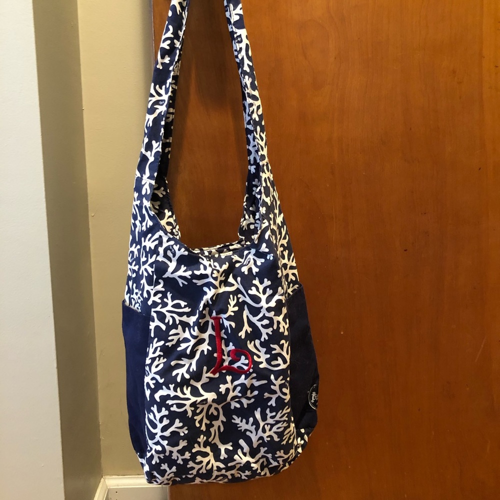 Cross body sling purse